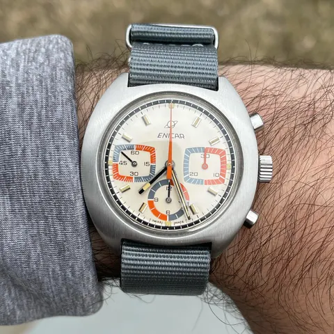 Ocean Pearl chronograph with a white dial and coloured registers in a cushion case, on the wrist