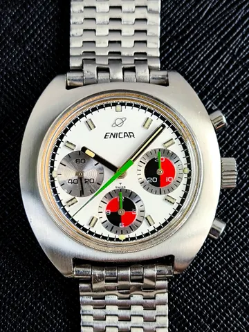 Ocean Pearl chronograph with a white dial, red-and-black and silver registers and green chronograph hand on a steel bracelet