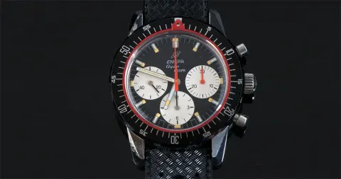Aqua Graph MkIV with a black dial and white registers, red chronograph hand and red ring, on a black textured strap
