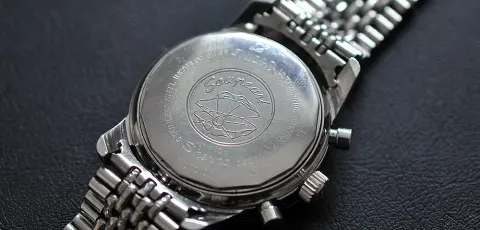 Aqua Graph caseback with the Seapearl medallion, on a beads-of-rice bracelet