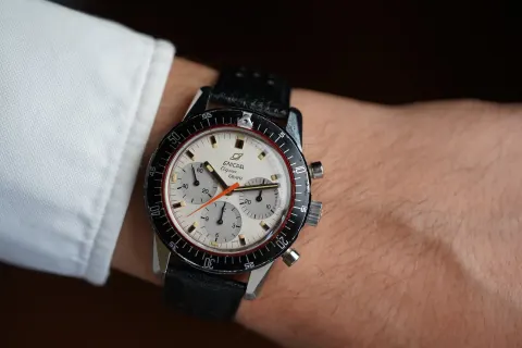 Aqua Graph MkIV with a white dial and black diving bezel, on the wrist