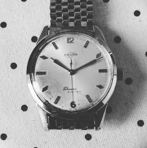 Steel Sherpa Electric with a silver dial on a steel bracelet, in black and white