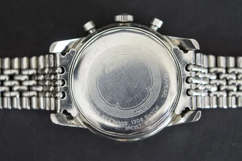 Sherpa Graph caseback stamped 1308 BaNCH, on a beads-of-rice bracelet