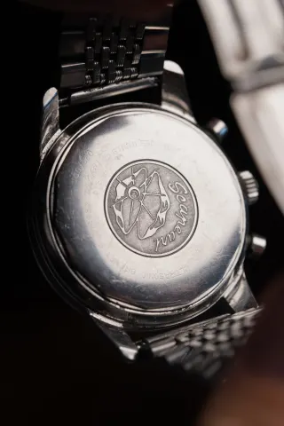 Caseback of a Sherpa Graph MkIII on a steel bracelet
