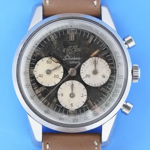 Sherpa Graph MkI with a black dial, cream registers and Tachymetre Base 1000 ring, on a brown strap