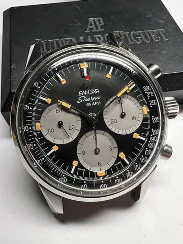 Sherpa Graph with a black dial, grey registers, orange-tipped paddle hands and a red-dot chronograph hand, without strap