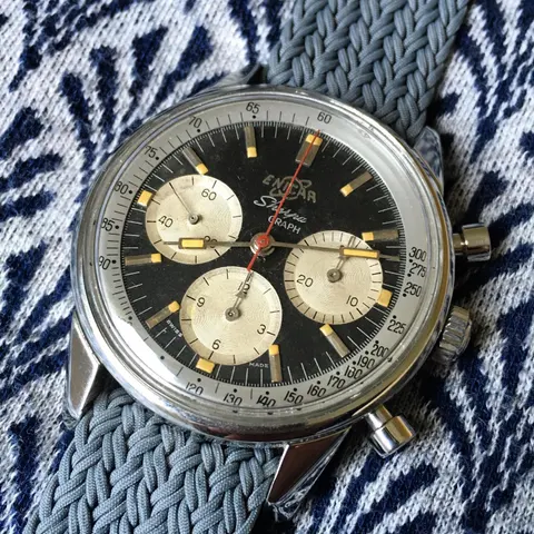 Sherpa Graph with a black dial and silver registers on a grey woven strap