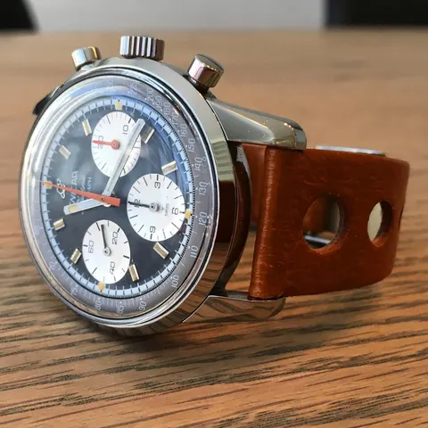 Sherpa Graph seen from the side, black dial with white registers, on a tan rally strap
