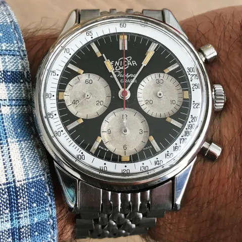 Sherpa Graph with a black dial, silver registers and white tachymetre ring on a steel bracelet, on the wrist