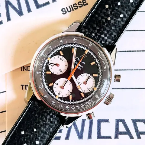 Sherpa Graph with a black dial, white registers and orange hands on a black Tropic strap
