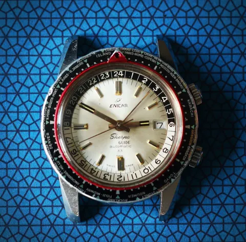 Sherpa Guide automatic 33 with a silver dial, red pointer ring and world-city outer bezel, without strap