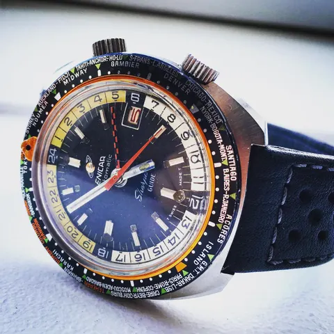 Sherpa Guide with a blue dial, yellow inner bezel and world-city outer bezel on a navy rally strap