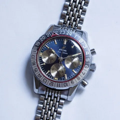 Jet Graph with a blue dial, silver registers and 24-hour bezel on a beads-of-rice bracelet