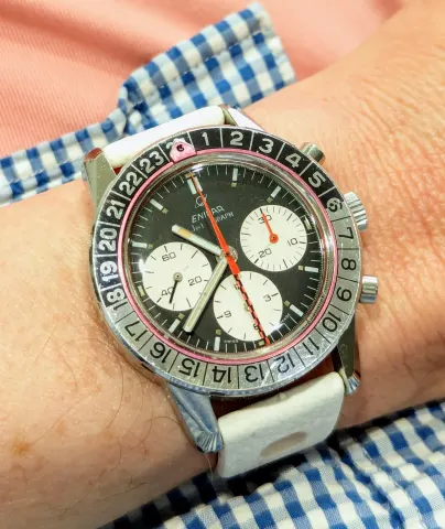 Jet Graph with a black dial, white registers and red chronograph and counter hands on a white strap