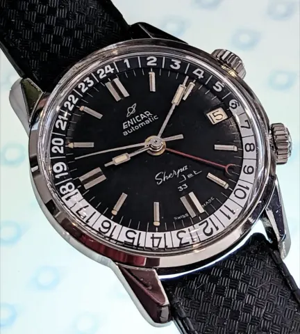 Sherpa Jet 33 with a black dial, black and white 24-hour bezel and paddle hands on a black rubber strap