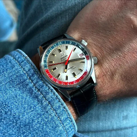 Sherpa Jet with a silver dial and red and blue inner bezel, checkered GMT hand, on the wrist