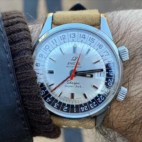 Sherpa Super-Jet with a silver dial, checkered GMT hand and black and white 24-hour scale on a tan suede strap