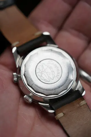 Caseback of a Sherpa Super-Jet, held in the hand