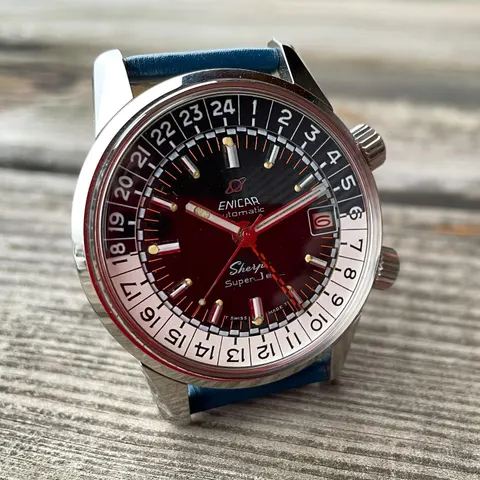 Sherpa Super-Jet with a black racing dial, checkered GMT hand and black and white 24-hour scale on a blue strap