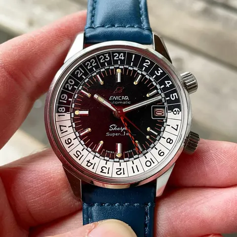 Sherpa Super-Jet with a black racing dial and checkered GMT hand on a blue leather strap